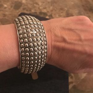 Silvertone cuff bracelet.       Bundle and $ave!